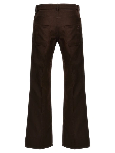 Shop Courrèges '70's Bootcut' Pants In Brown