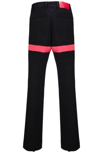Shop Ferragamo Trousers In Black || Red