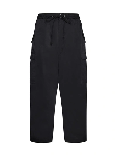 Shop Junya Watanabe Comme Des Garcon Trousers In Black