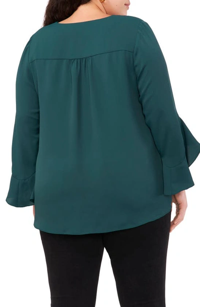 Shop Vince Camuto Flutter Sleeve Crossover Georgette Tunic Top In Deep Forest