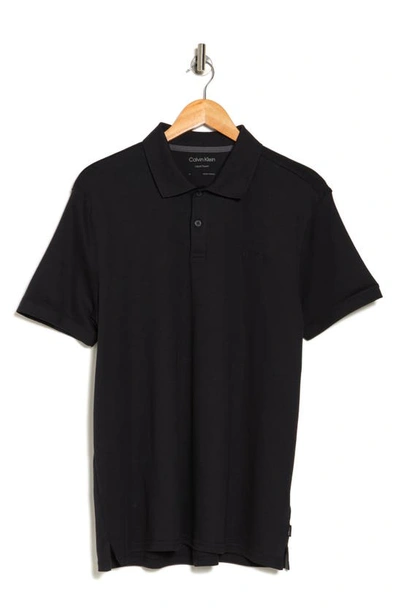 Shop Calvin Klein Liquid Touch Interlock Cotton Polo In Black Solid