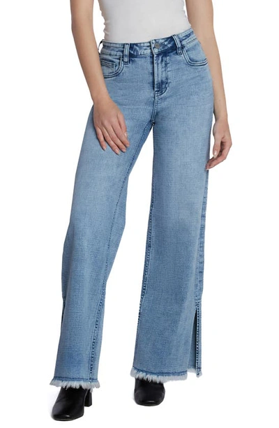 Shop Hint Of Blu Frayed Split Hem Mid Rise Wide Leg Jeans In Split Blue