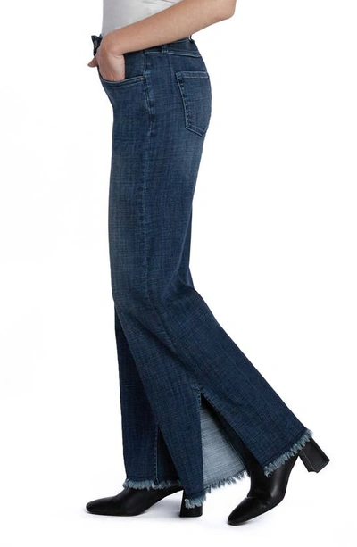 Shop Hint Of Blu Frayed Split Hem Mid Rise Wide Leg Jeans In Market Blue