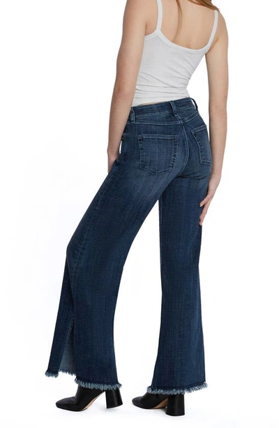 Shop Hint Of Blu Frayed Split Hem Mid Rise Wide Leg Jeans In Market Blue