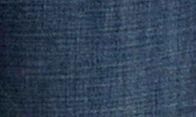 Shop Hint Of Blu Frayed Split Hem Mid Rise Wide Leg Jeans In Market Blue