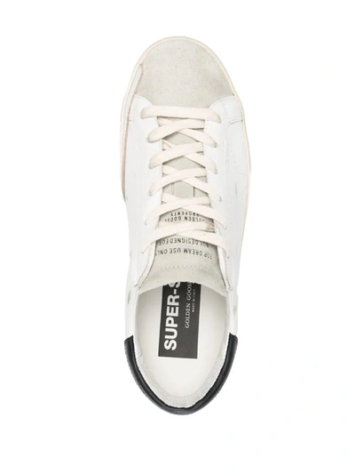 Shop Golden Goose Super-star Distressed Lace-up Sneakers In White/ice/black