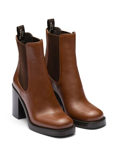 Shop Prada Brushed Leather 85mm Ankle Boots In Cognac
