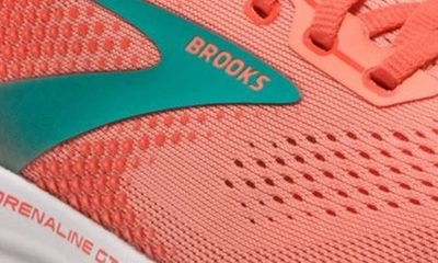 Shop Brooks Adrenaline Gts 22 Sneaker In Coral/ Latigo Bay/ White