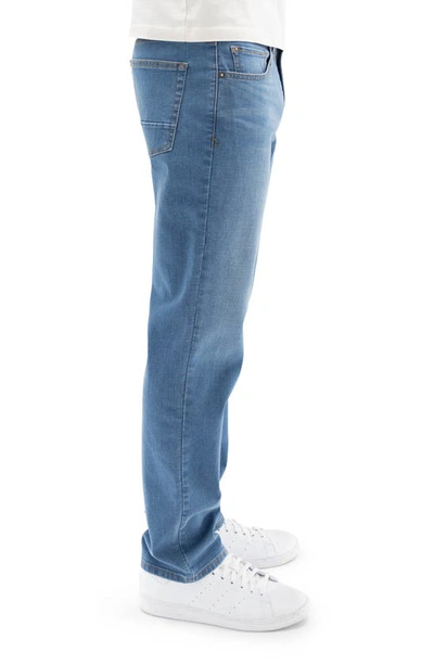 Shop Devil-dog Dungarees Slim Straight Leg Performance Jeans In Blue Rock