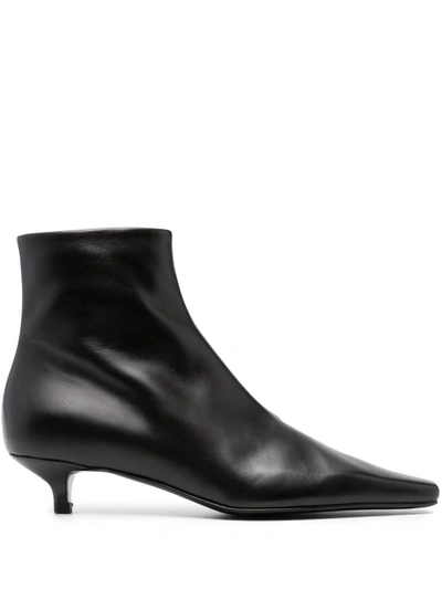 Shop Totême Boots Ankle In Black