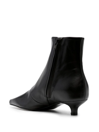 Shop Totême Boots Ankle In Black