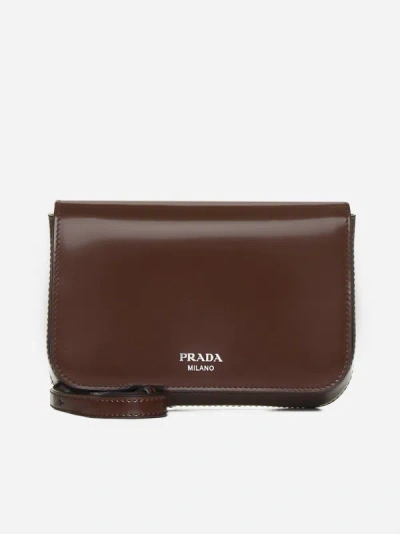 Shop Prada Leather Crossbody Bag In Brown
