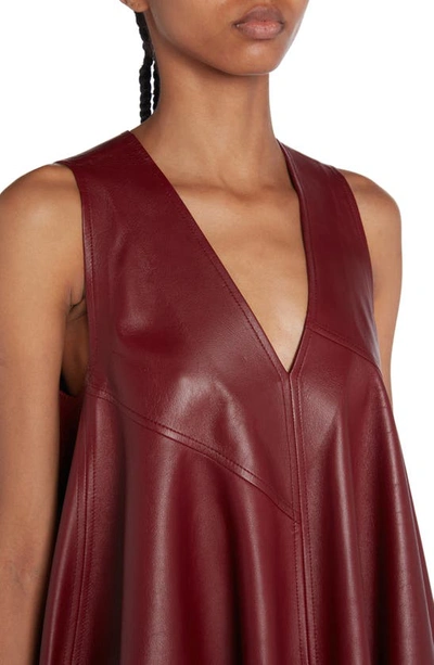 Shop Bottega Veneta Sleeveless Leather Trapeze Minidress In Pomegranate