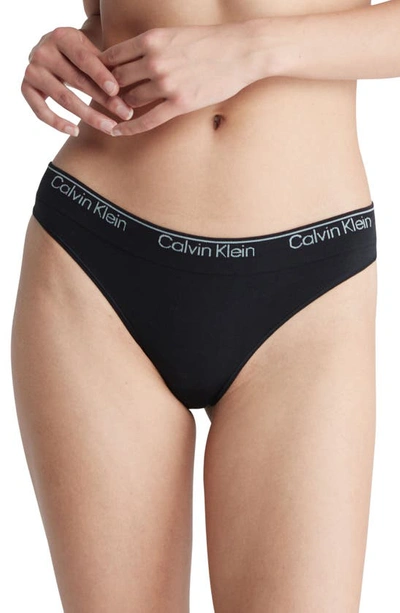 Shop Calvin Klein Naturals Modern Seamless Thong In Black