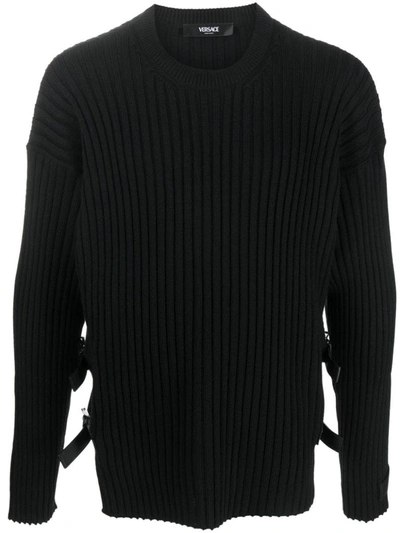 Shop Versace Buckles Detail Wool Sweater In Black
