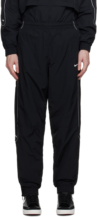 Shop Nike Black Solo Swoosh Track Pants In Black/white
