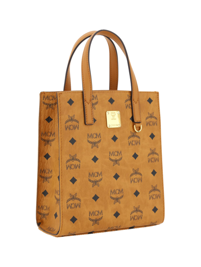 Shop Mcm Aren Mini Tote Handbag In Cognac