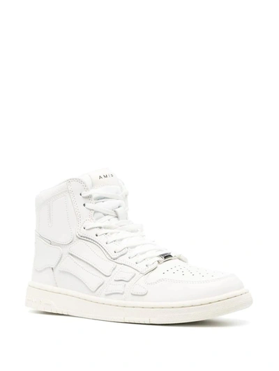 Shop Amiri Skel High Sneakers In White