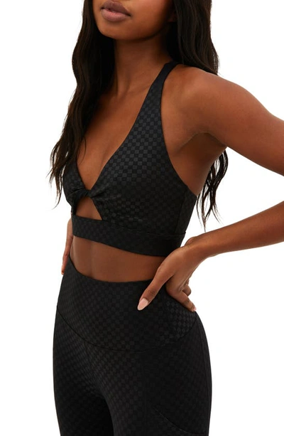 Shop Beach Riot Twist Front Cutout Sports Bra In Black Embossed Check