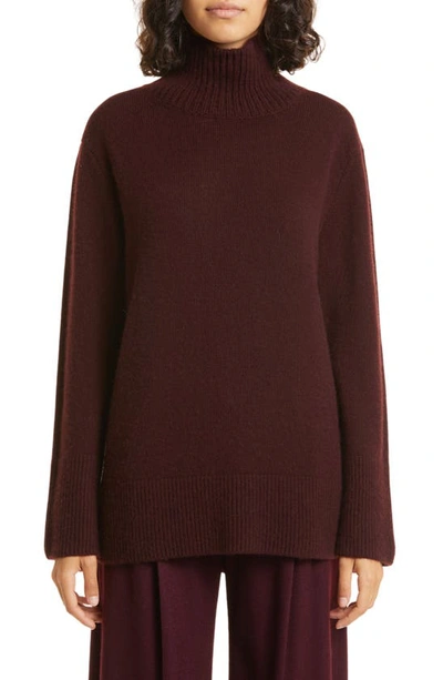 Shop Vince Wool & Cashmere Turtleneck Tunic Sweater In Black Fig