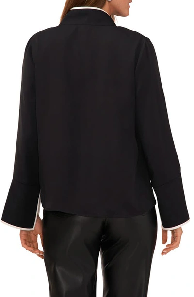 Shop Vince Camuto Trim Split Neck Top In Rich Black