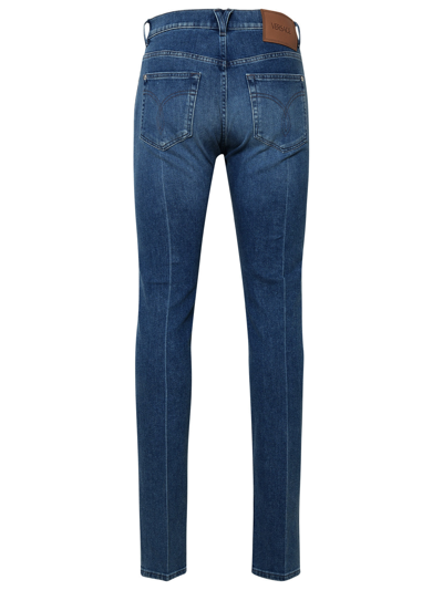 Shop Versace Man  Light Blue Cotton Jeans