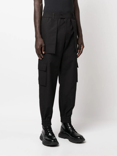 Shop Alexander Mcqueen Pantaloni Cargo In Black