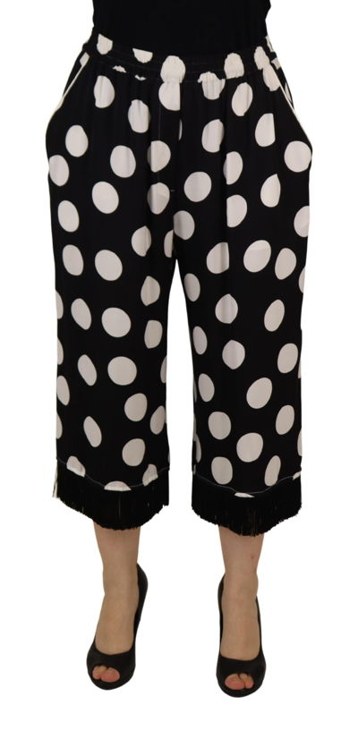 Shop Dolce & Gabbana Polka Dot Mid Waist Cropped Trouser Pants In Black