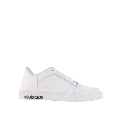 Shop Roberto Cavalli Classic Logo Embossed Sneakers In White
