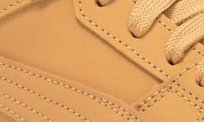 Shop Puma Rebound Joy Buck Faux Leather Sneaker In Taffy-taffy