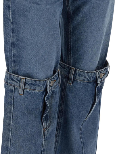 Shop Coperni Open Knee Jeans In Washed Blue