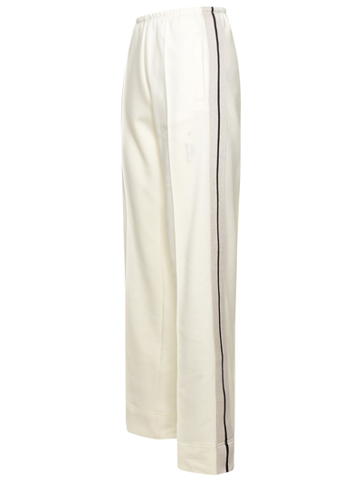 Shop Palm Angels Ivory Cotton Blend Trousers In Beige