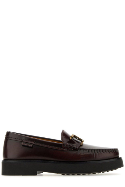 Shop Tod's Logo Plaque Round Toe Loafers In S003