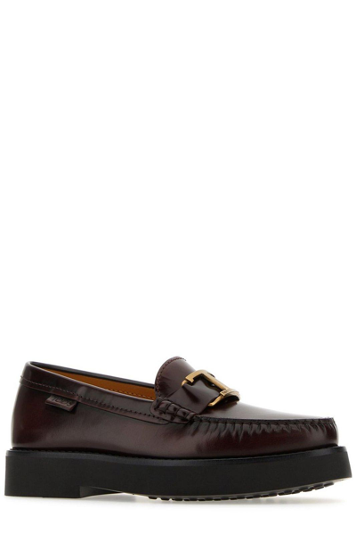 Shop Tod's Logo Plaque Round Toe Loafers In S003