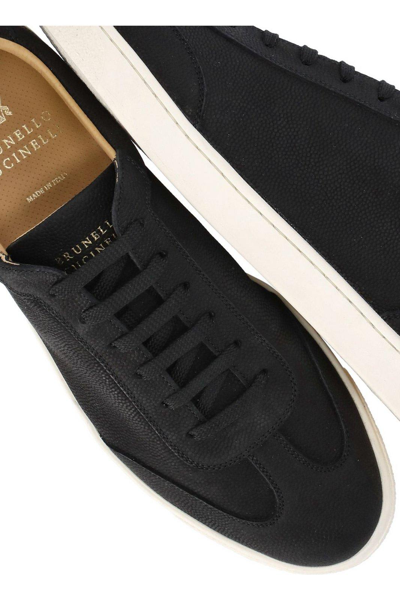 Shop Brunello Cucinelli Logo Embossed Low-top Sneakers In Black