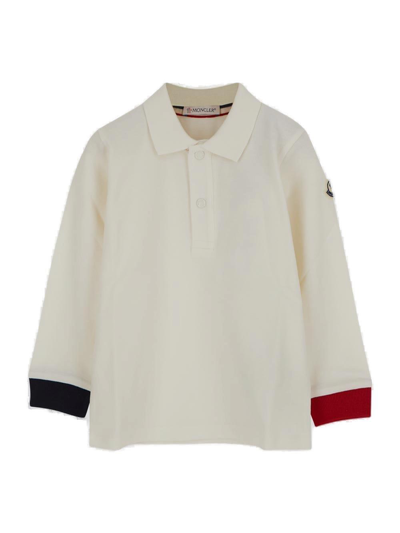 Shop Moncler Button Detailed Long-sleeved Polo Shirt In Ivory