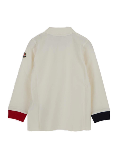 Shop Moncler Button Detailed Long-sleeved Polo Shirt In Ivory