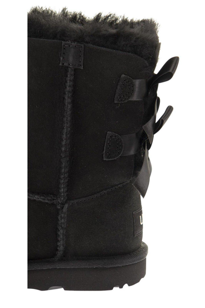Shop Ugg Bailey Bow Ii Boots In Nero