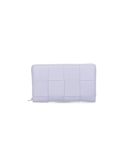 Shop Bottega Veneta Intreccio Zip Around Wallet In Purple