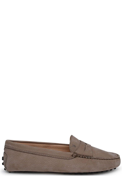 Shop Tod's Gommino Almond Toe Loafers In Beige