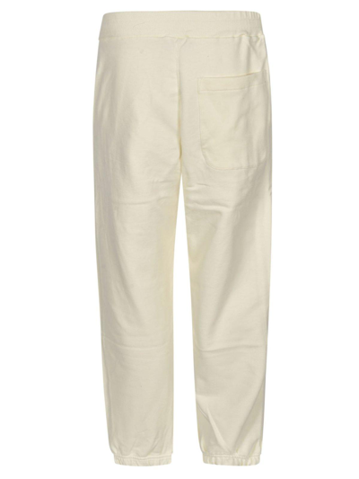 Shop Msgm Logo Printed Track Pants In Off White