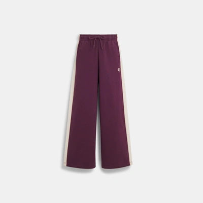 Shop Coach Outlet Track Pants In Red
