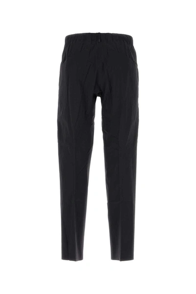 Shop Veilance Pants In Black