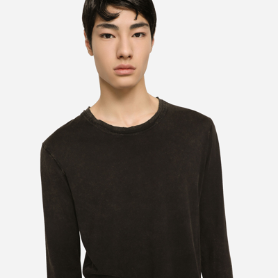 Shop Dolce & Gabbana Long-sleeved Overdyed Jersey T-shirt In Black