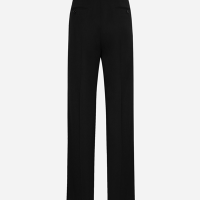 Shop Dolce & Gabbana Flared Woolen Pants In Black