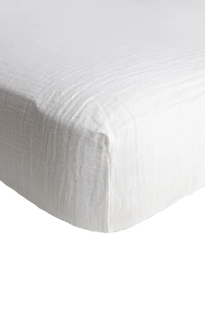 Shop Little Unicorn Cotton Muslin Crib Sheet In White
