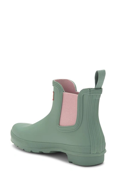 Shop Hunter Original Waterproof Chelsea Rain Boot In Sweet Gale Green/ Azalea Pink