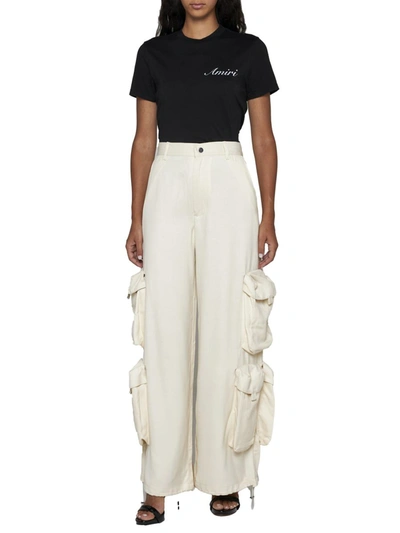 Shop Amiri Trousers In Alabaster