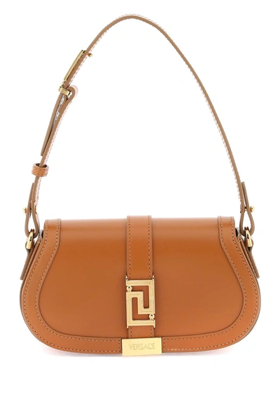 Shop Versace 'greca Goddess' Mini Shoulder Bag Women In Brown