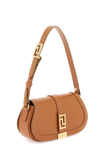 Shop Versace 'greca Goddess' Mini Shoulder Bag Women In Brown